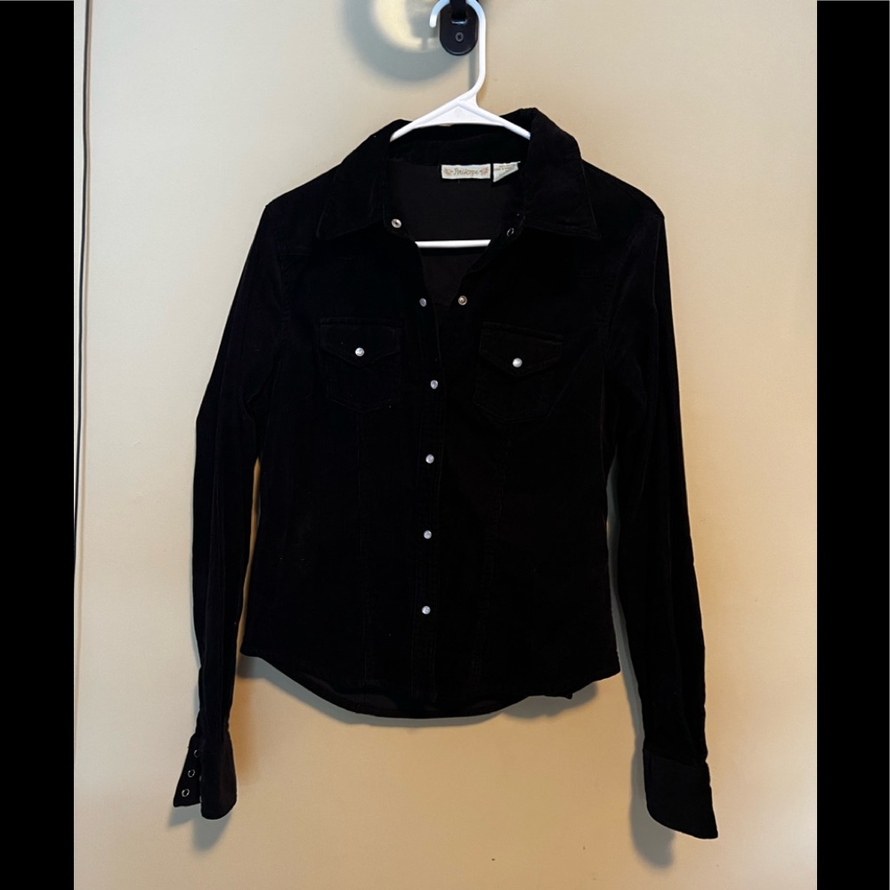 Fine black corduroy jean type jacket. Thin type
